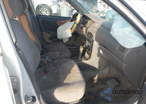 1999 Chevrolet Prizm z USA, uszkodzony, nr VIN 1Y1SK5282XZ435882